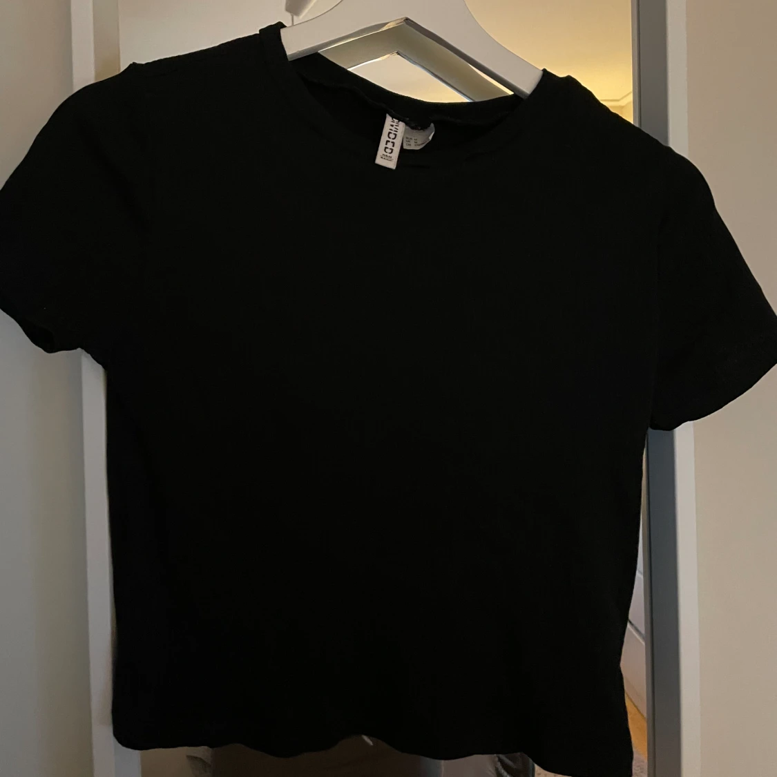 Svart ribbad T-shirt  - 91