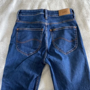 Bootcut Jeans från Lee - Breese Kicked jeans från Lee, W26 L31. Aldrig använda, sitter som en smäck med stretch