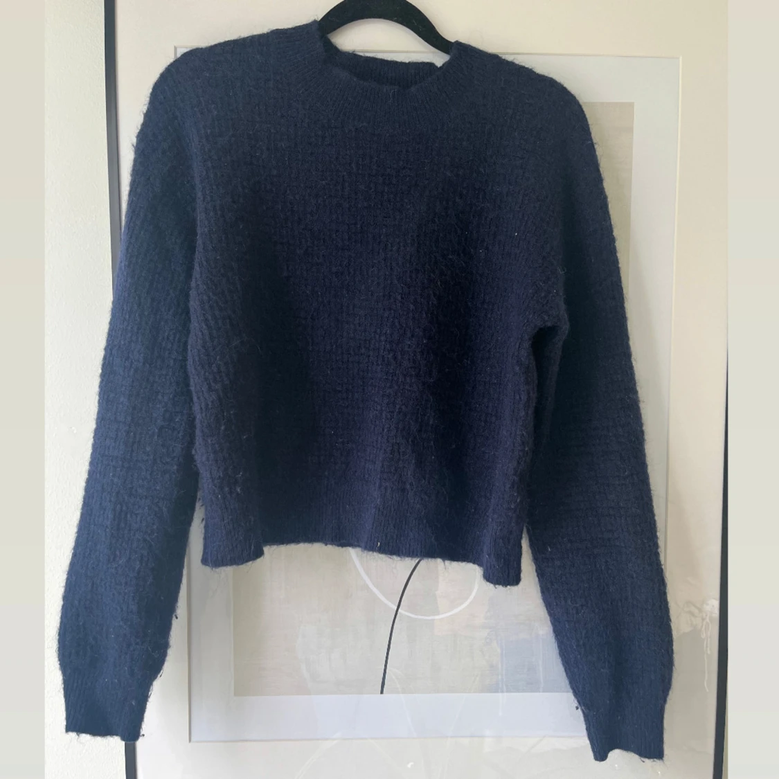 Blå stickad tröja