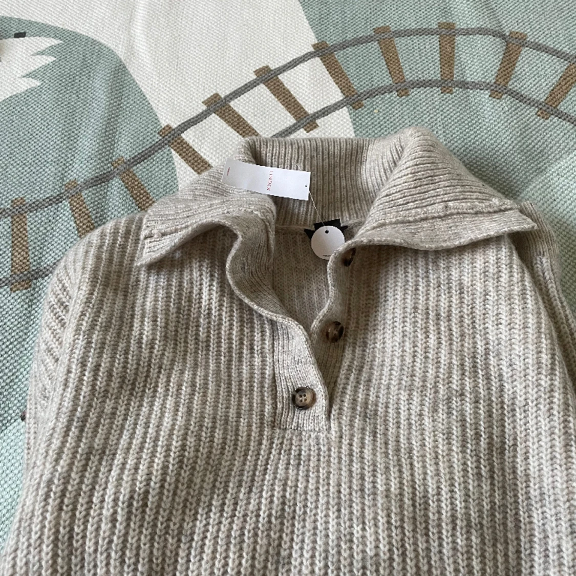 Stickad lång tröja - 90