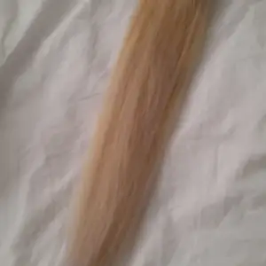 Ponytail äkta hår 55 cm använd 1 gång går att färga platta o locka 