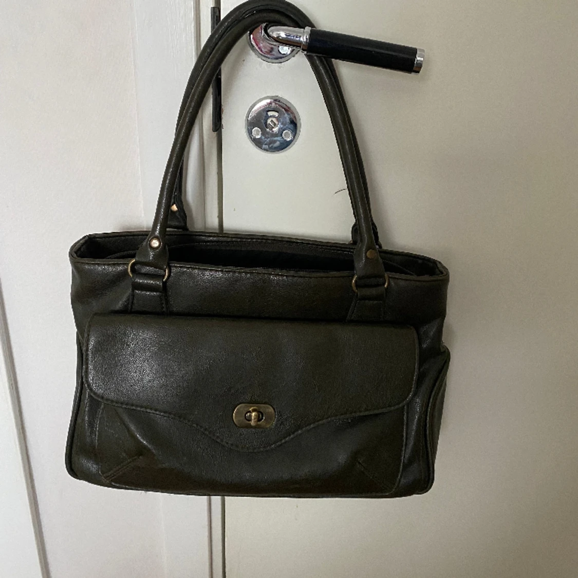 Mörkgrön handväska