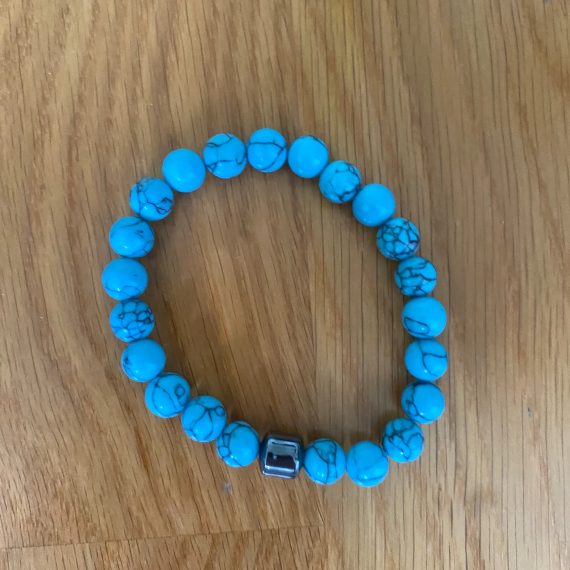 Ljusblå marmorarmband