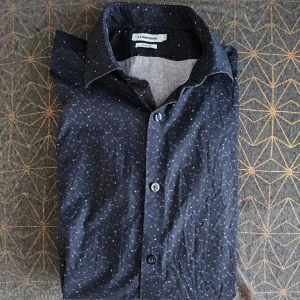 J.Lindeberg dark blue shirt  - In ok condition. Would prefer pick-up rather than posting.