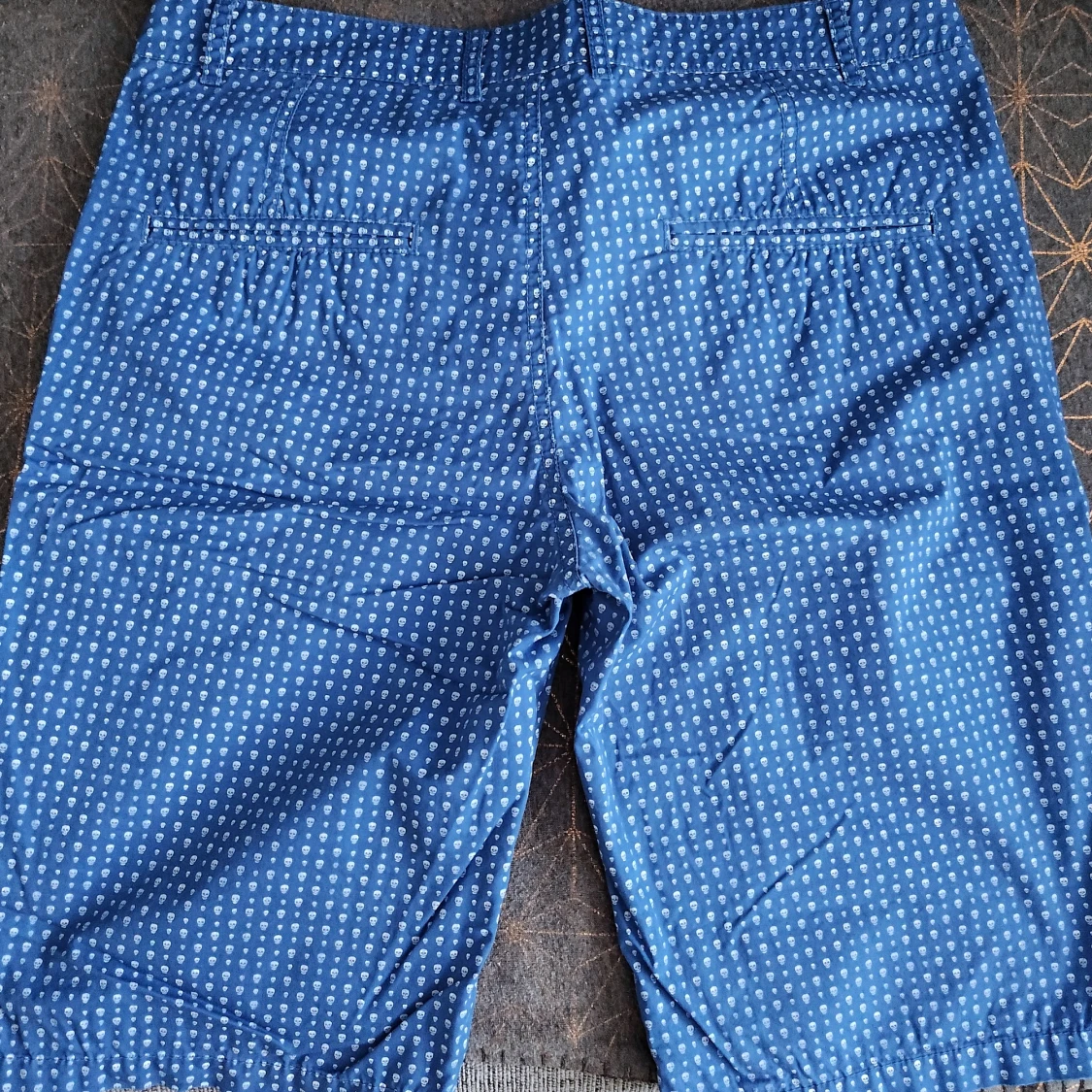 Zara blue shorts with white skulls - 91