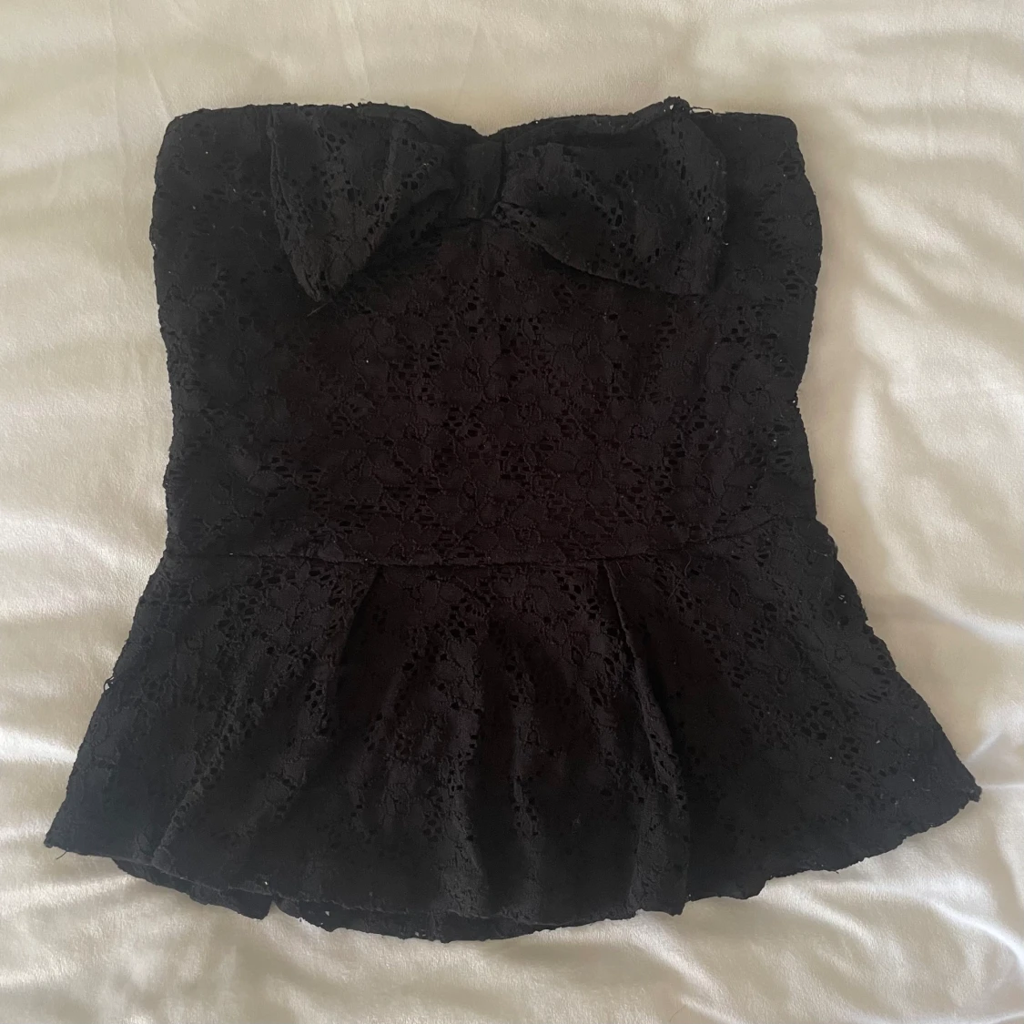 Svart peplum topp
