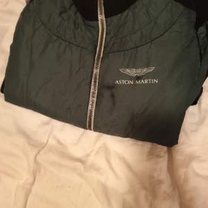 A well-used Jacket from Hackett London featuring the hard-to-get Aston Martin emblem to surprise you with faint speed 