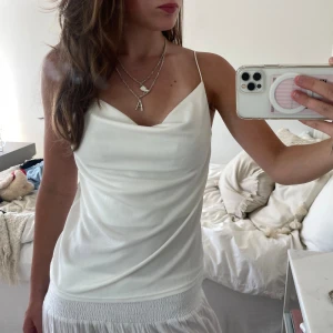 Vit fest topp - Galet snygg topp från märket polly! 