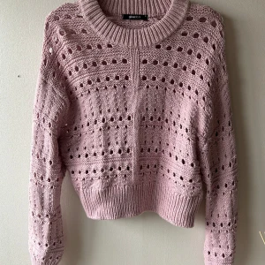 Rosa tröja - Tröja från Gina med hål. Oanvänd.