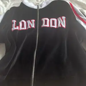  Hoodie with London written  on it 