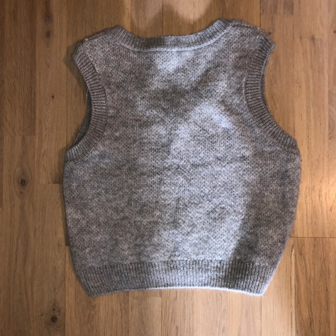 Stickad ullväst - 90
