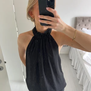 Halterneck topp - Kommer inte till användning längre!