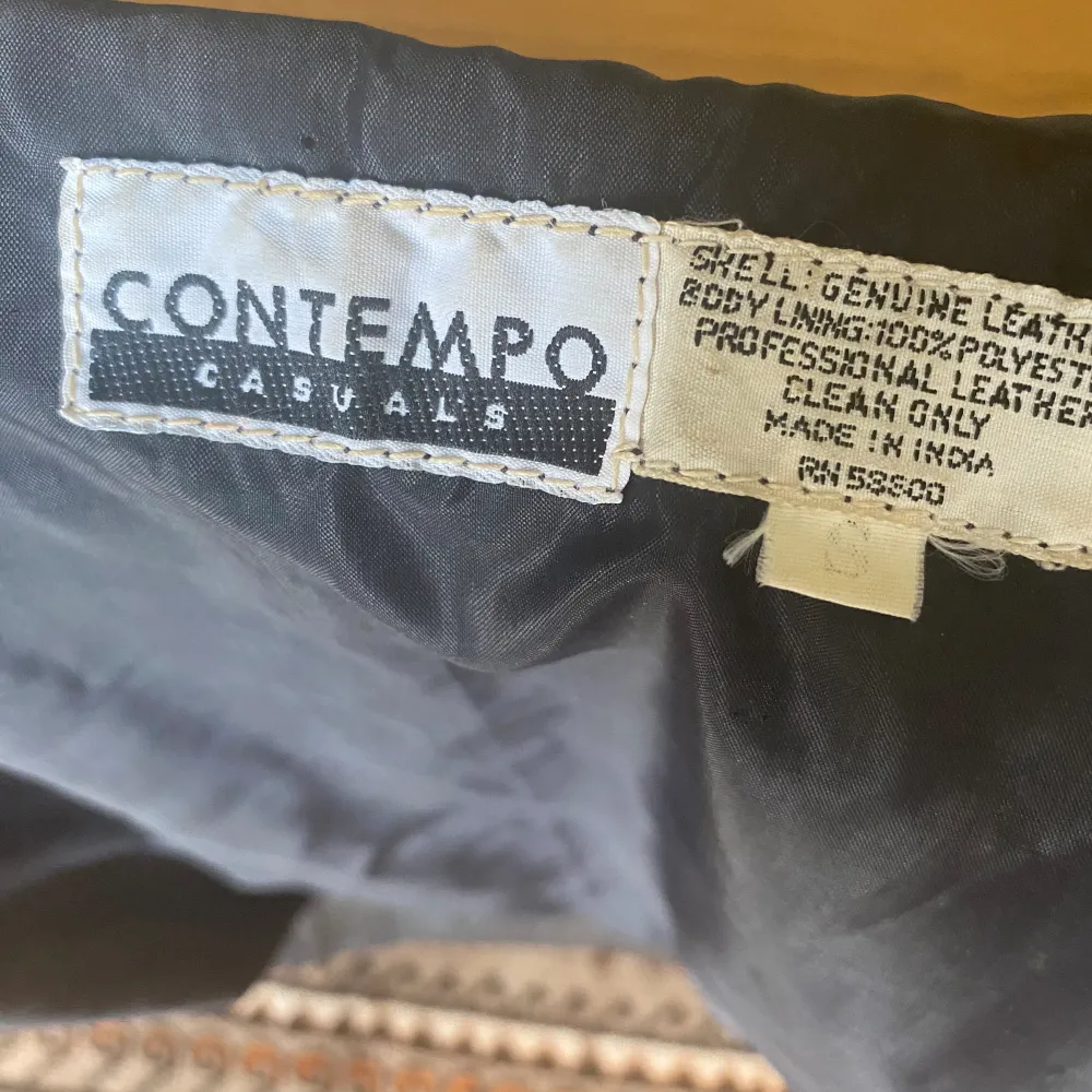 Size small and is true to size. Contempo was a very trendy shop in Los Angeles in the 80s. Jacket is in mint condition!. Jackor.