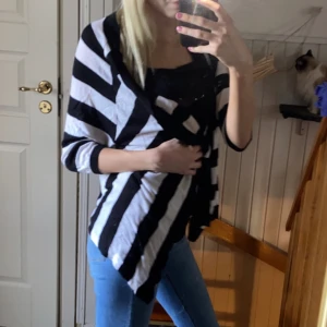 Cardigan - En cardigan i storlek 170.