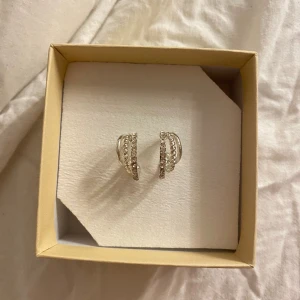 Örhängen  - Fina örhängen med tre ringar!