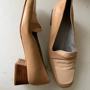 Made in the softest leather with beautiful wooden heels. Not used more than 5 times. Made in Spain.
