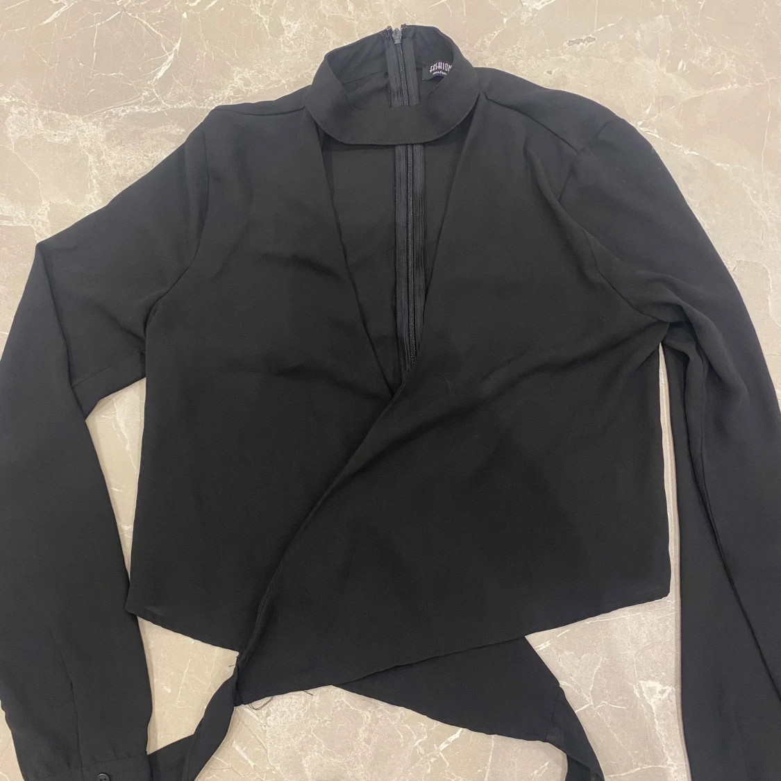 Svart blus magtröja