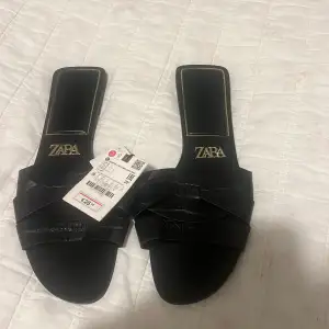 Brand new zara black flip flops 
