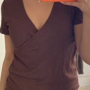 Ribbad omlott T-shirt  - Kommer inte till användning 