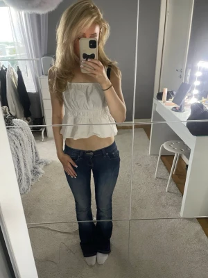 Mörkblå Jens - Low waighst bootcut jeans