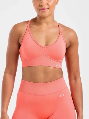  AYBL tränings bh  - Jätte fin adapt seamless sport bra från AYBL i färgen summer peach, en orange rosa korallfärg. Helt ny med prislapp endast testat säljer då den va för liten. Säljer även matchande shorts 