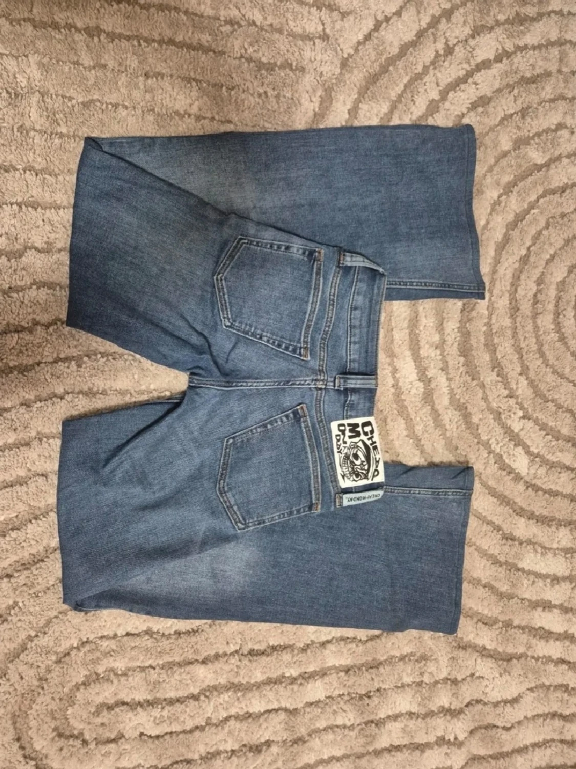 Blå extremt lowwaist bootcut jeans från Cheap Monday
