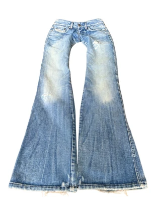 Ljusblå vintage superlågmidjade jeans  - Såå sjukt snygga vintage superlågmidjade jeans från diesel! 