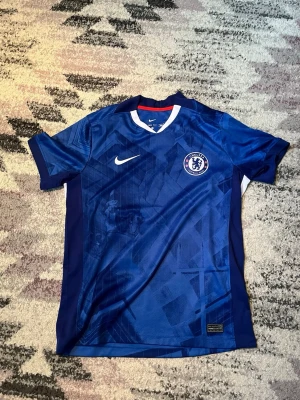 Chelsea S 25/26 - Hög kvalité använd fåtal gånger perfekt för en Chelsea älskare.
