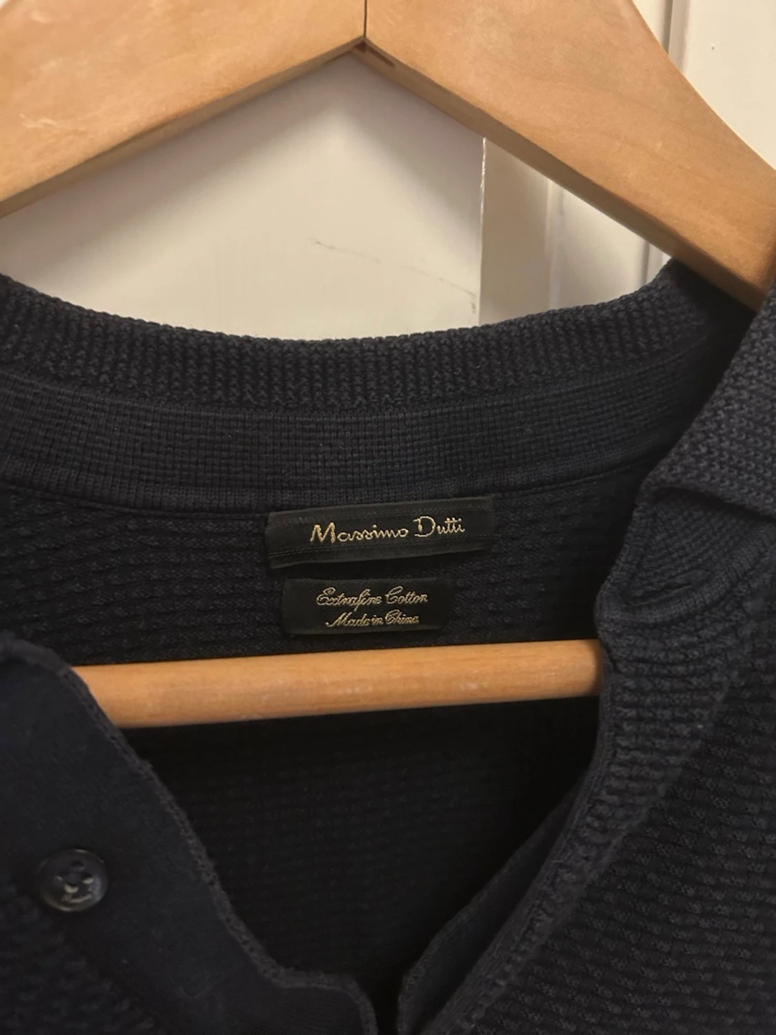 Mörkblå stickad piké  - 2