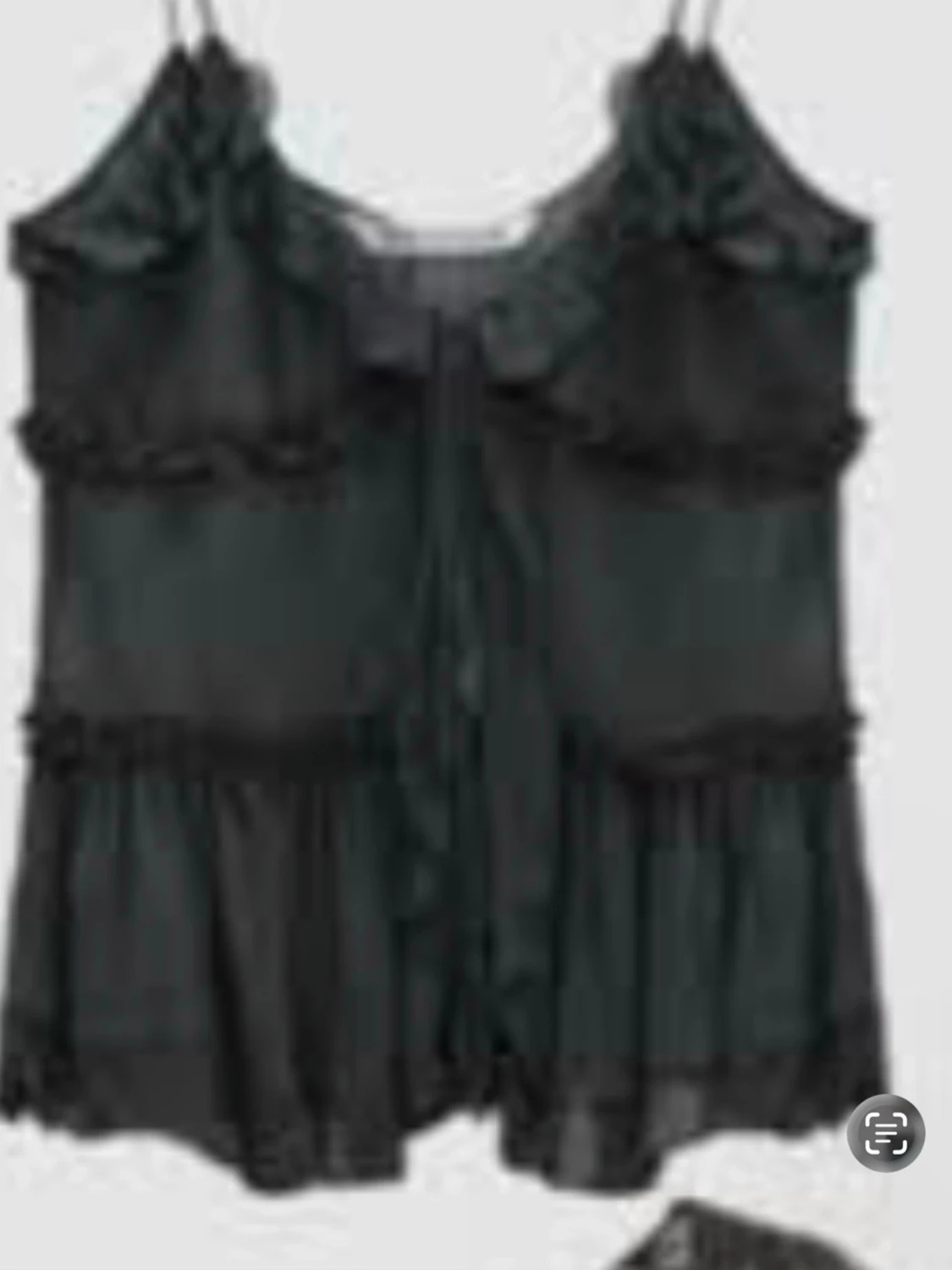 Svart spetsbody med volanger