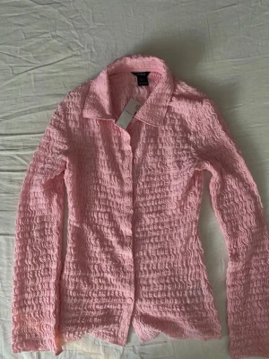 Rosa tröja - Helt ny tröja, orginalpris 399kr