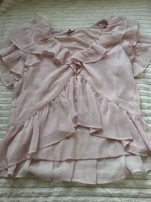 Rosa blus från nelly  - Rosa blus från nelly i storlek 32 bra skick!