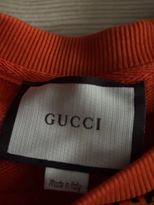 Orange longarm tröja gcci  - pris går att diskutera