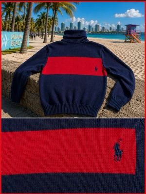 Blå stickad tröja Polo Ralph Lauren - Mörkblå stickad tröja från Polo Ralph Lauren med hög krage och en bred röd panel över bröstet. Tillverkad i 100% bomull och har ribbade muddar vid ärmslut och nederkant. Klassisk och stilren design med diskret logga på bröstet.