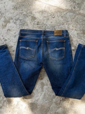 Nudie jeans - Säljer dessa snygga Nudie jeans som kostar ca 1800kr nypris. Modellen är Tube Kelly och storlek är W31 L34. De är mycket bra skick (inga deffekter). Skriv vid funderingar!