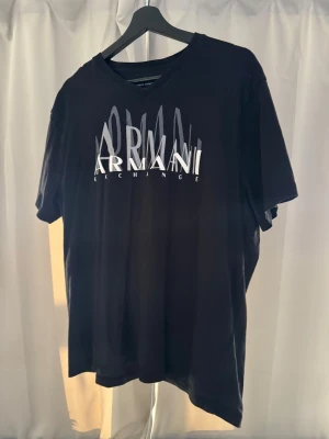 Armani T-shirt  - Armani T-shirt NY aldrig använd.