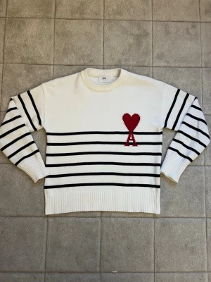 Ami Paris Sweater - 100% Cotton Sweater. It’s Very Soft and Comfortable, and you won’t find another with this unique striped look!