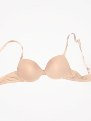 vanlig beige bh - Snygg beige bh med vadderade kupor och bygel för extra stöd. Justerbara axelband och klassisk hakknäppning bak. Enkel och stilren design utan synliga mönster eller spets. Perfekt under ljusa plagg för en osynlig look.