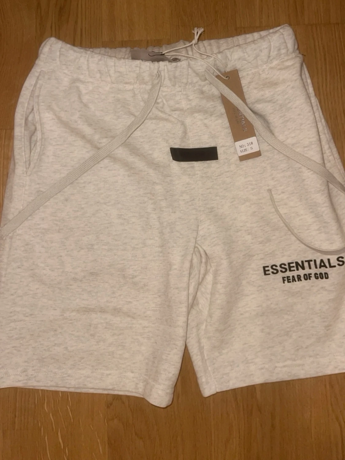 Essentials Fear of God shorts ljusgrå - 1