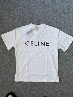 Cline White T shirt - Size M. true to size, very comfy and fits nice. Questions DM