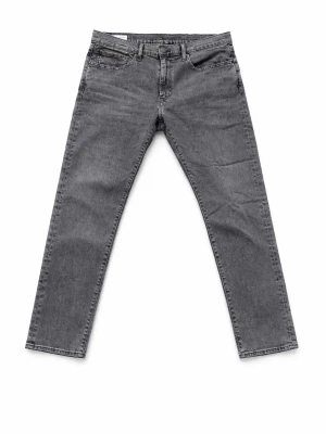 Levis 502 - Snygga grå jeans från Levi's med rak passform och klassisk femficksdesign. Jeansen har en diskret tvättad look och är tillverkade i slitstark denim. Perfekta för en avslappnad och trendig stil. Storleken är 34/32