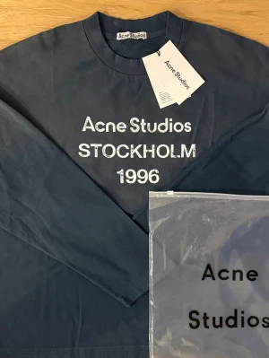 Acne studios longsleeve (M/Navy) - Great condition, used once. Same day shipping.  Comes with the original bag that it came with. Relaxed/ baggy fit. 100% cotton.