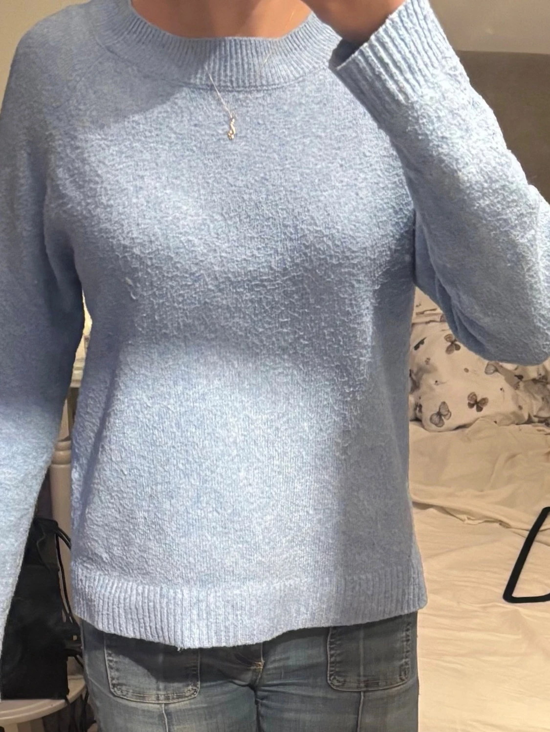 Ljusblå stickad tröja