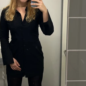Black short dress long sleeves - Super cool black dress with stretchy and comfy material. I wore it only few times as it is a bit too short for me. 