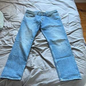 Ett par baggy tiger of sweden jeans som är i väldigt bra skick, storlek 36/32