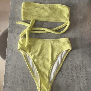 Never used bikini from missguided. High waist panty and bandeau top.   Bottom size 36 Top size 36
