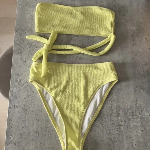 New bikini  - Never used bikini from missguided. High waist panty and bandeau top.   Bottom size 36 Top size 36