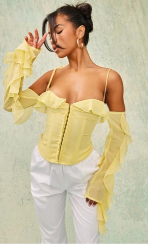 Korsett topp med volang - Aldrig använd, liten i storlek strlk 36