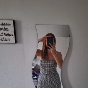 Jumpsuit - Skön och tumn jumpsuit svart vit rutig i bra sick 