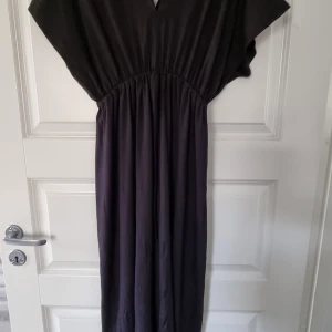 Klänning  - Storlek  one size  Längd slutar vid knät Bomull  tyg